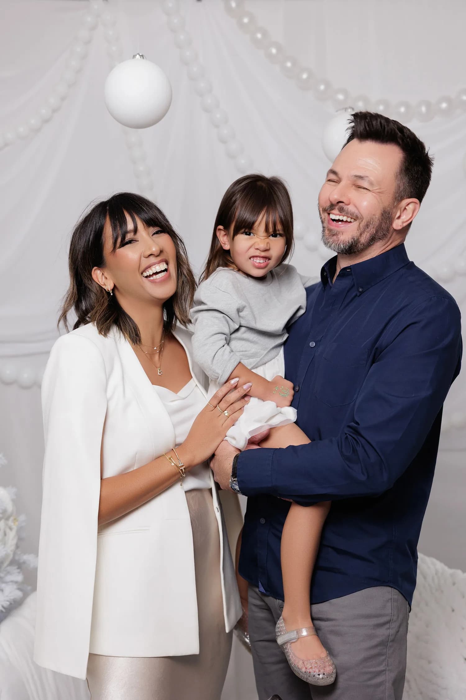Christmas portraits from previous years — a family photographed at Natalie Vell Studio