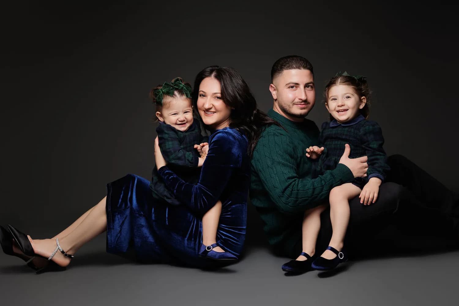Christmas portraits from previous years — a family photographed at Natalie Vell Studio
