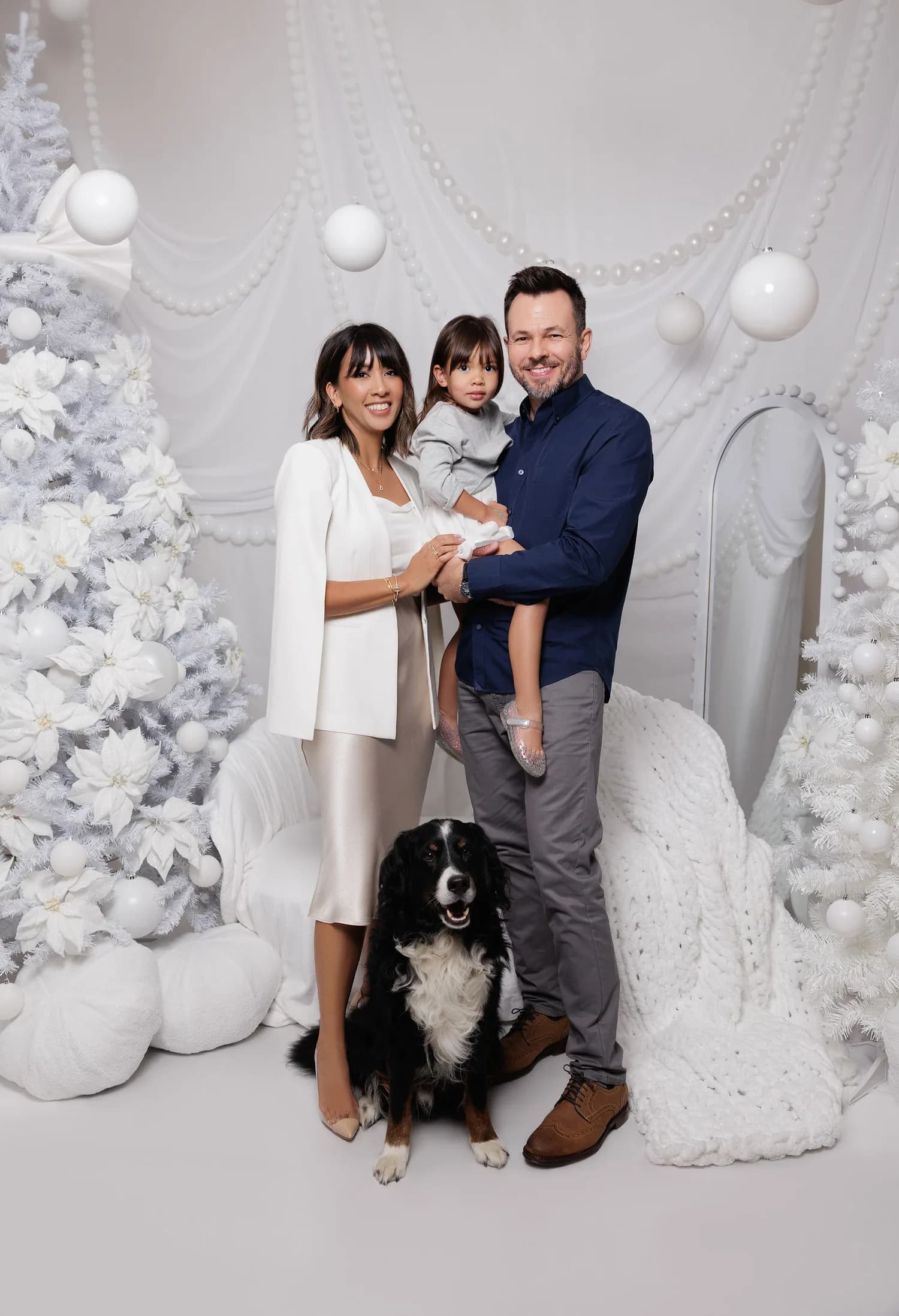 Christmas portraits from previous years — a family photographed at Natalie Vell Studio
