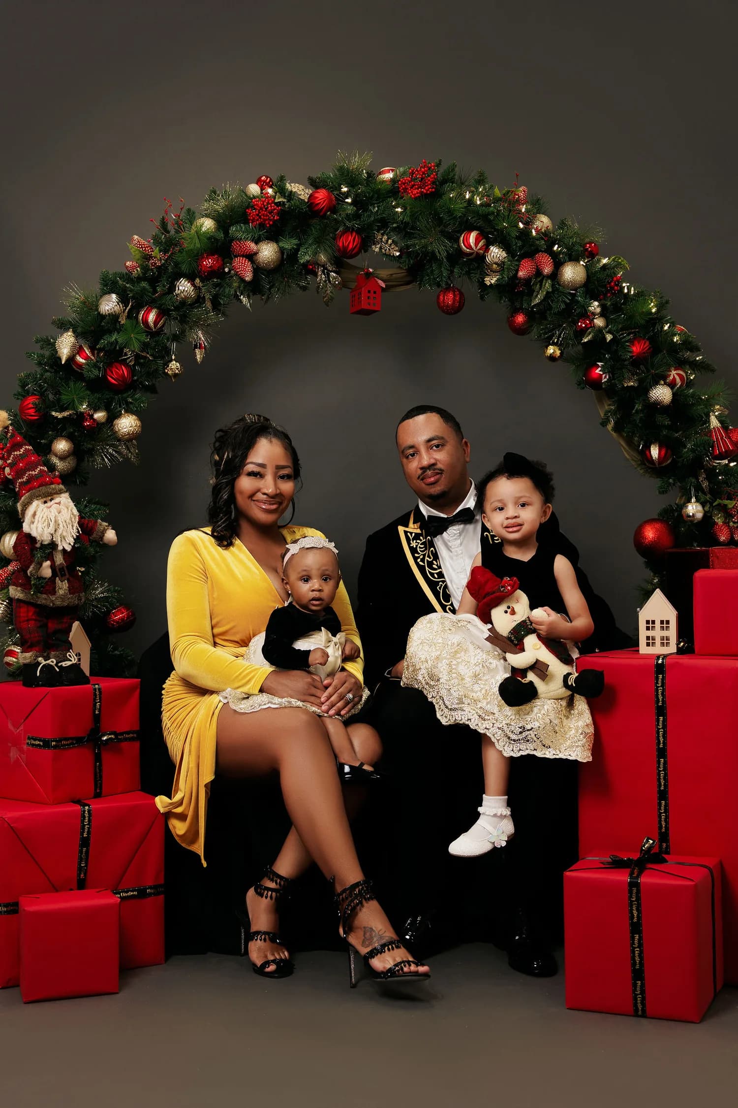 Christmas portraits from previous years — a family photographed at Natalie Vell Studio