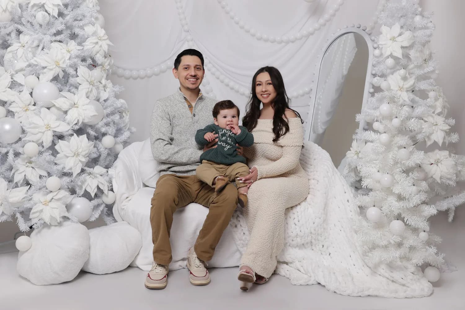 Christmas portraits from previous years — a family photographed at Natalie Vell Studio