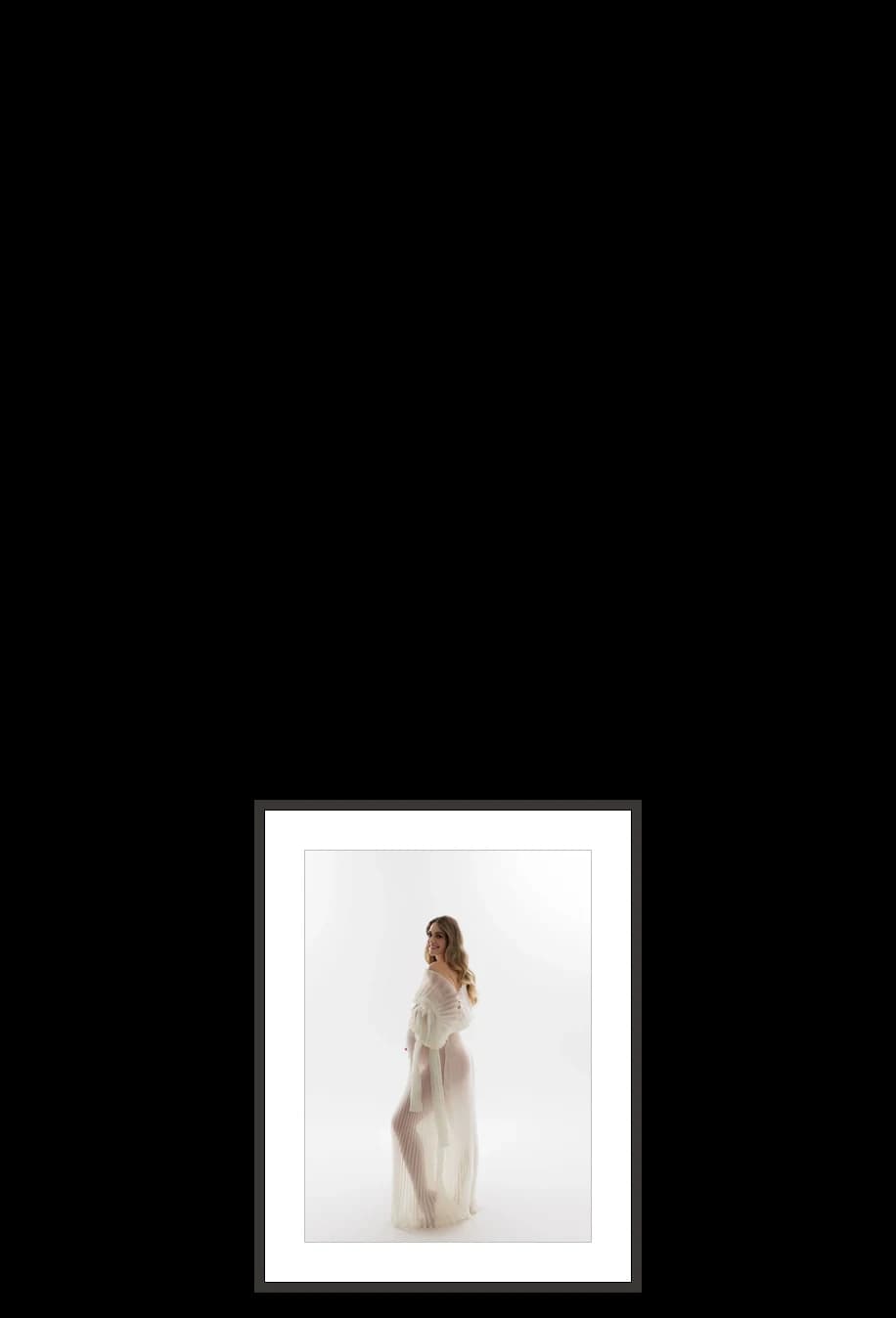 A 11×14 print in a black frame, beside the other sizes at the size it really is