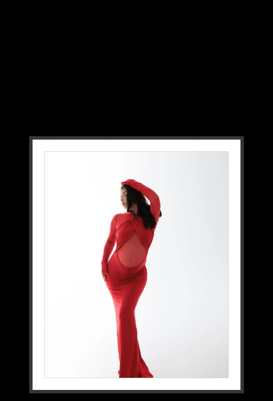 A 20×24 print in a black frame, beside the other sizes at the size it really is